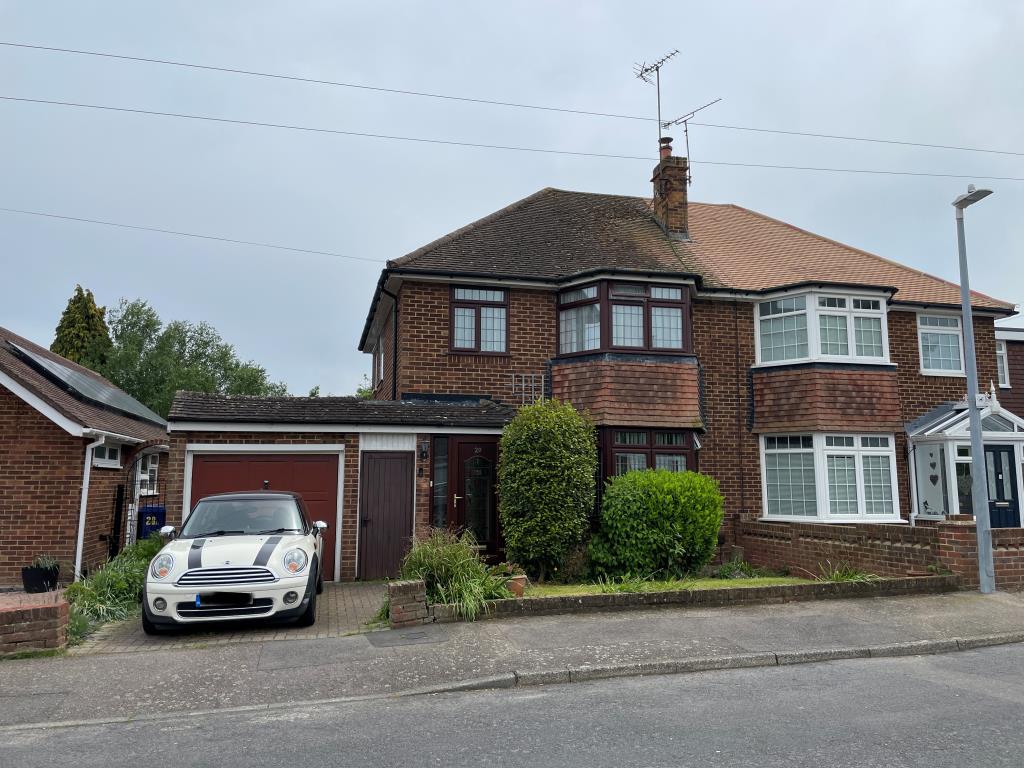 Lot: 48 - THREE-BEDROOM SEMI FOR IMPROVEMENT - External photo of bay fronted semi with garage